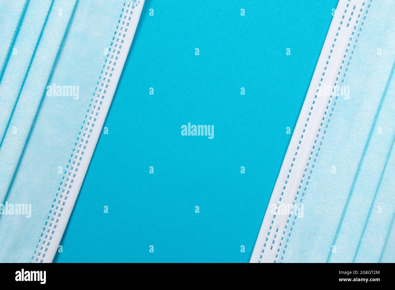 Blue medical masks on table hi-res stock photography and images - Alamy