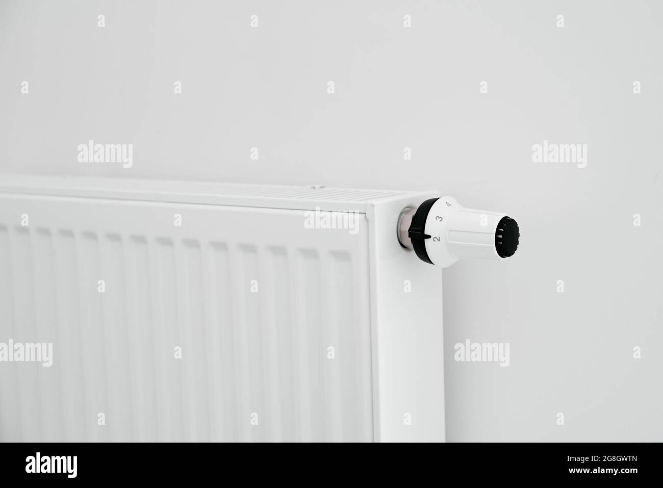 Heat radiator knob. Adjusting temperature on heating radiator Stock