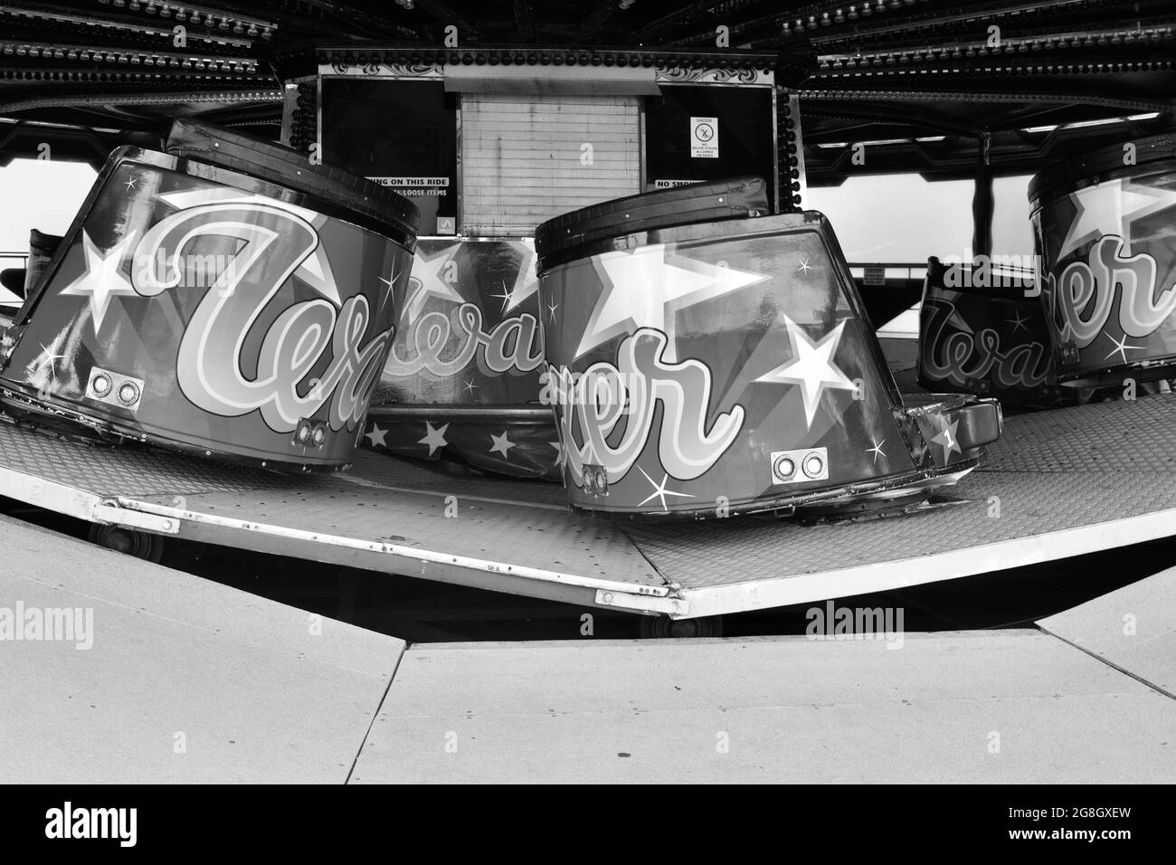 Monochrome image nostalgic summer vacation vibes, fairgrounds rides ...