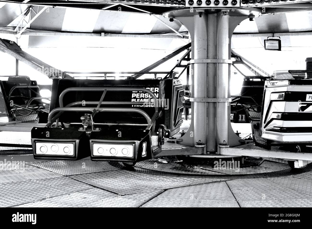 Monochrome image nostalgic summer vacation vibes, fairgrounds rides ...