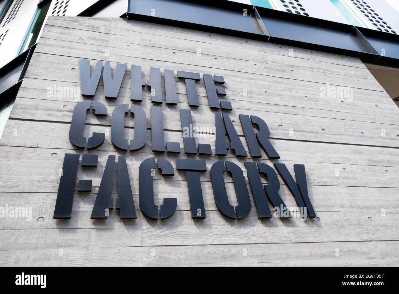 Close up view of WHITE COLLAR FACTORY sign on the side of the modern building exterior at Old Street Silicon Roundabout in London UK KATHY DEWITT Stock Photo