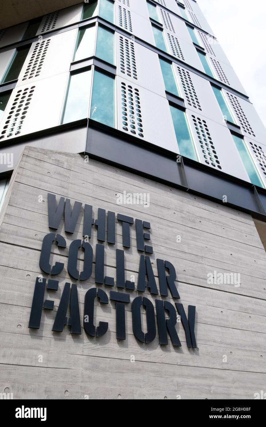Close up view of WHITE COLLAR FACTORY sign on the side of the modern building exterior at Old Street Silicon Roundabout in London UK KATHY DEWITT Stock Photo