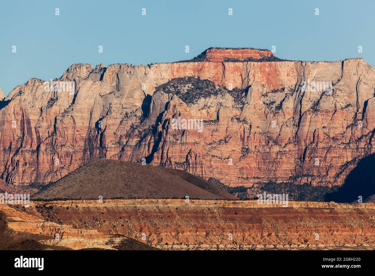 The dramatic sandstone mountains and cliffs of Zion National Park with ...