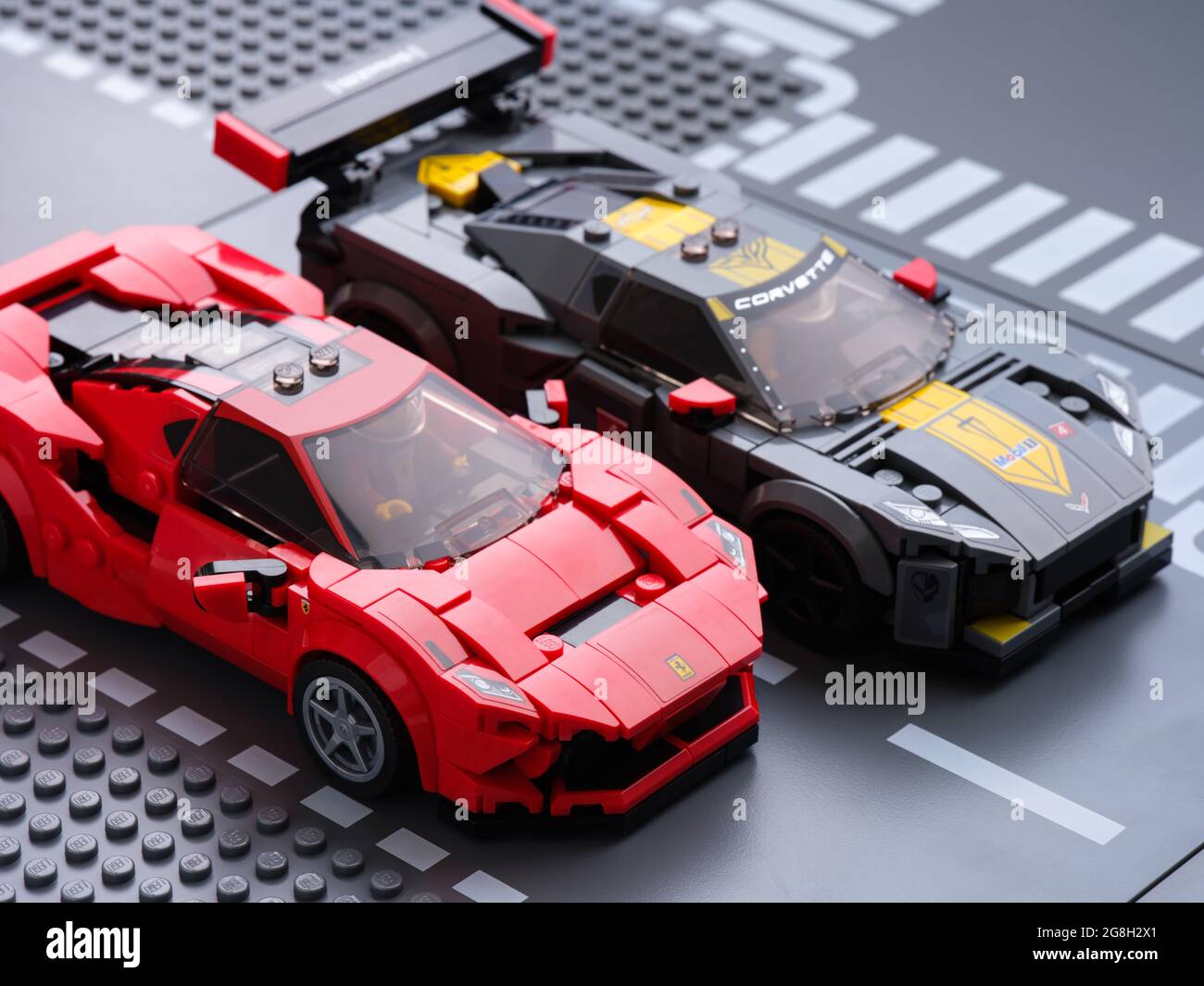 Tambov, Russian Federation - July 07, 2021 Lego Ferrari F8 Tributo and Lego  Chevrolet Corvette C8.R race cars on road baseplate. Lego Speed Champions  Stock Photo - Alamy