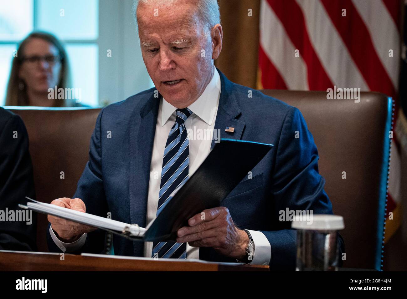 Washington, USA. 20th July, 2021. U.S. President Joe Biden looks over his notes during a cabinet meeting at the White House in Washington, DC, U.S., on Tuesday, July 20, 2021. Biden administration officials say they're starting to see signs of relief for the global semiconductor supply shortage, including commitments from manufacturers to make more automotive-grade chips for car companies. Photographer: Al Drago/Pool/Sipa USA Credit: Sipa USA/Alamy Live News Stock Photo