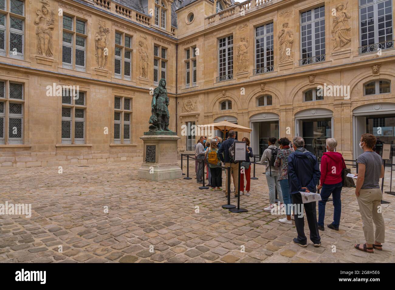 Paris, France - 07 16 2021: View of the statue of Louis XIV inside the courtyard of Carnavalet Museum Stock Photo