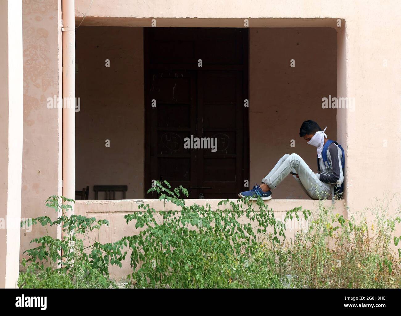 Beawar, India. 20th July, 2021. Indian student waits to submit exam forms at government college in Beawar. (Photo by Sumit Saraswat/Pacific Press) Credit: Pacific Press Media Production Corp./Alamy Live News Stock Photo