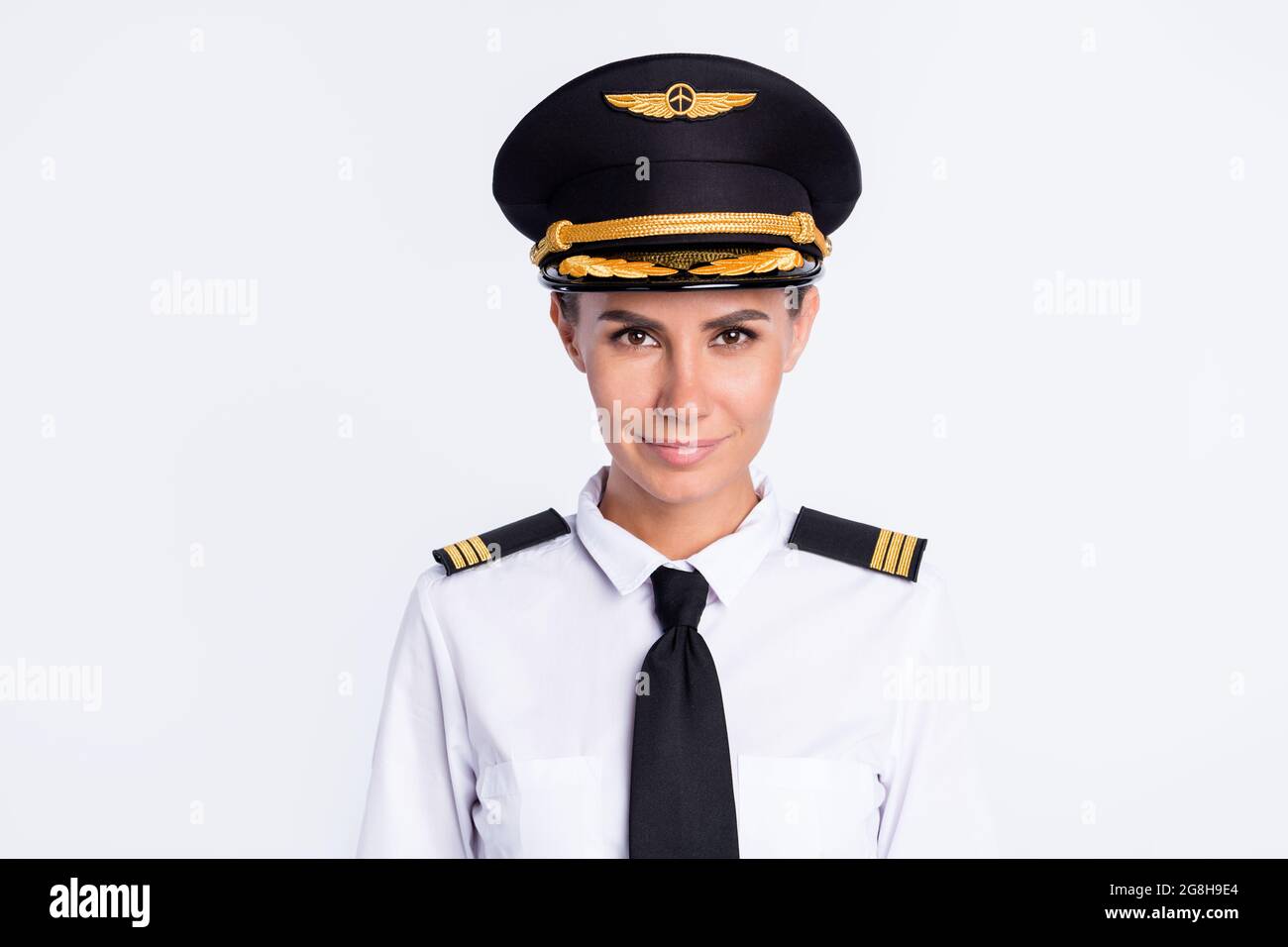 Photo of positive confident pilot lady 