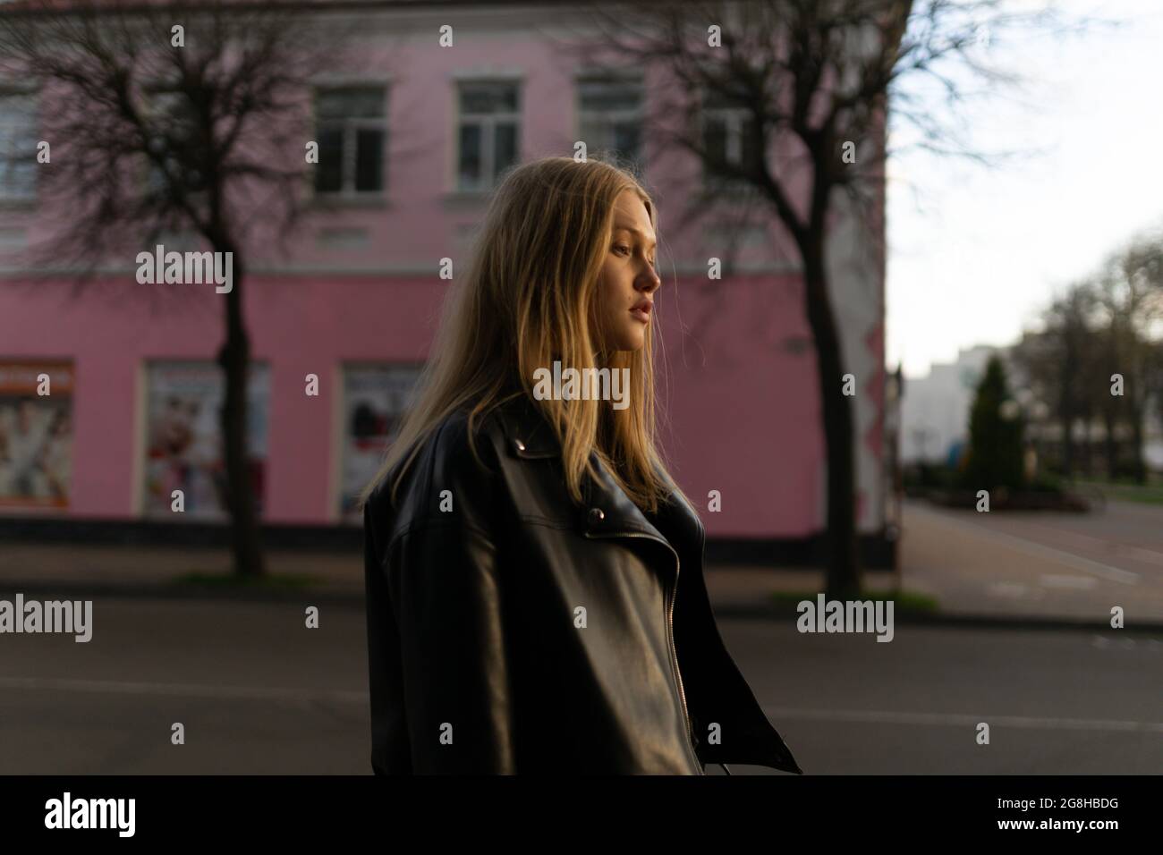 Blonde woman in leather hi-res stock photography and images - Alamy