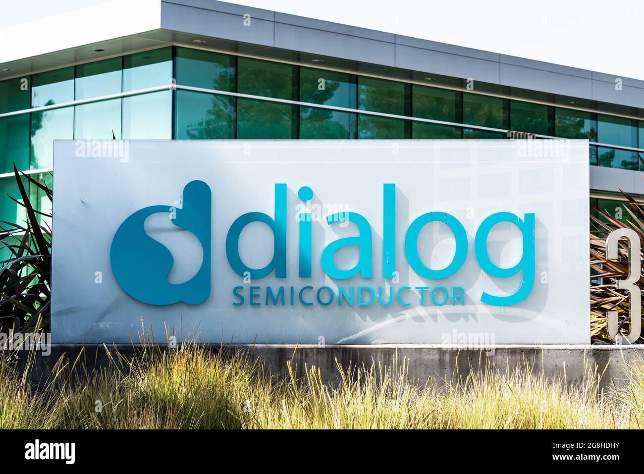Sep 16, 2020 Santa Clara / CA / USA - Dialog Semiconductor sign at the Silicon Valley HQ; Dialog Semiconductor PLC is a manufacturer of semiconductor Stock Photo