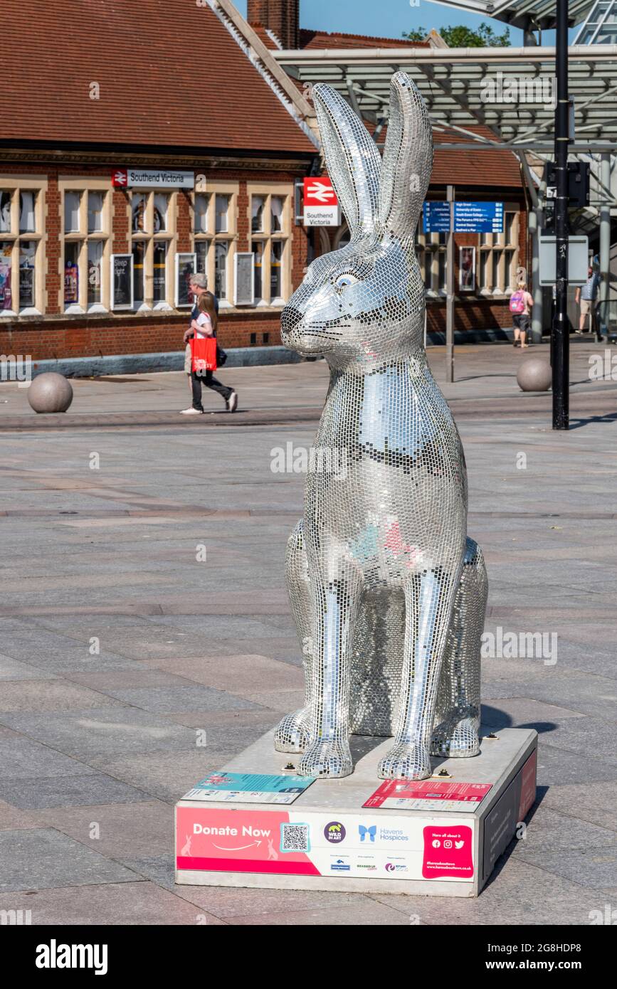 Glitter mosaic covered Hares about Town giant hare animal sculpture figure outside Southend Victoria station in Southend on Sea, Essex, UK Stock Photo