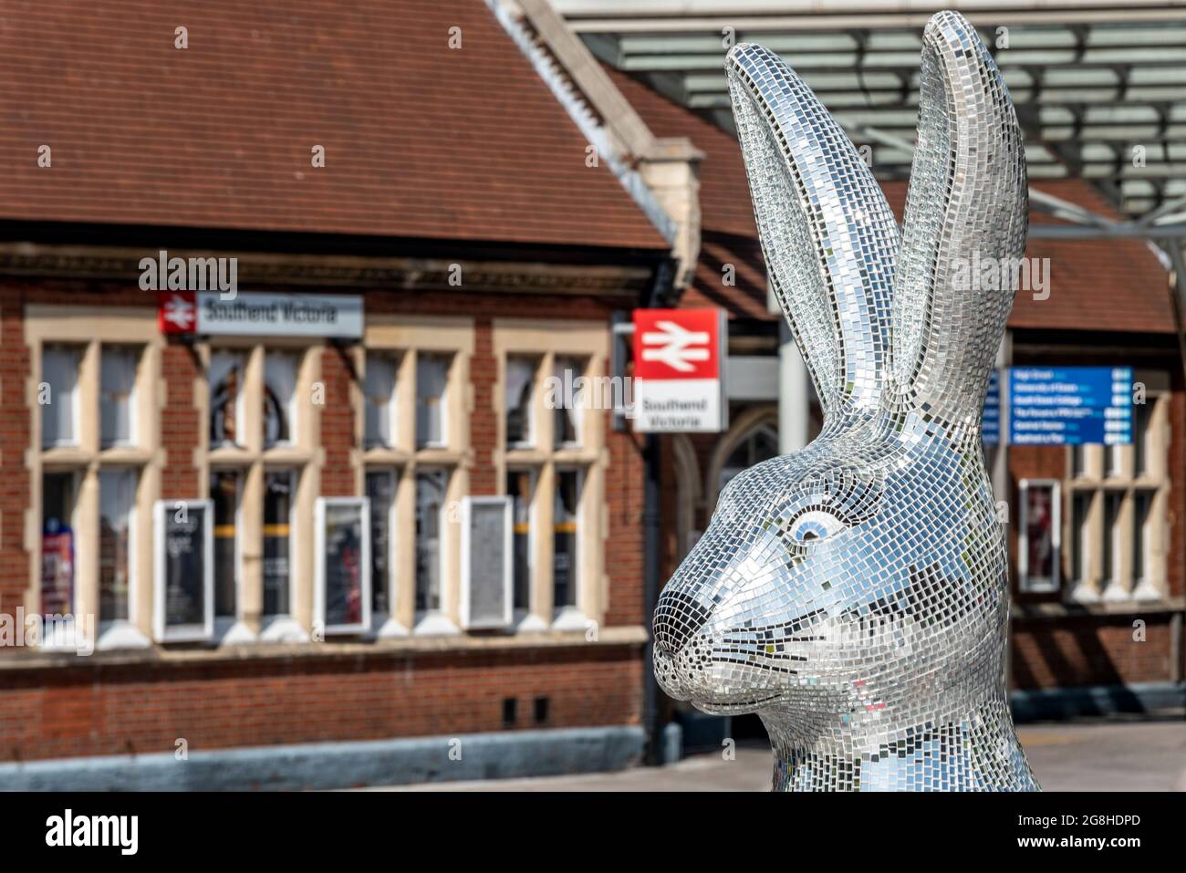 Glitter mosaic covered Hares about Town giant hare animal sculpture figure outside Southend Victoria station in Southend on Sea, Essex, UK Stock Photo