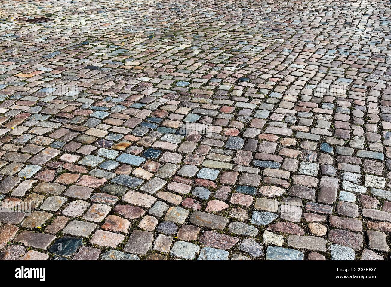 Close up view on old historical cobblestone roads and walkways all over