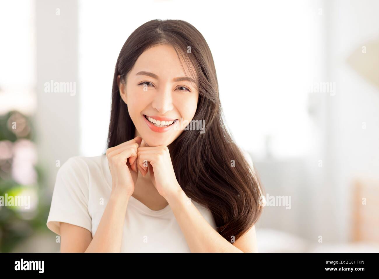 closeup smiling  young  woman face with clean and  healthy skin Stock Photo