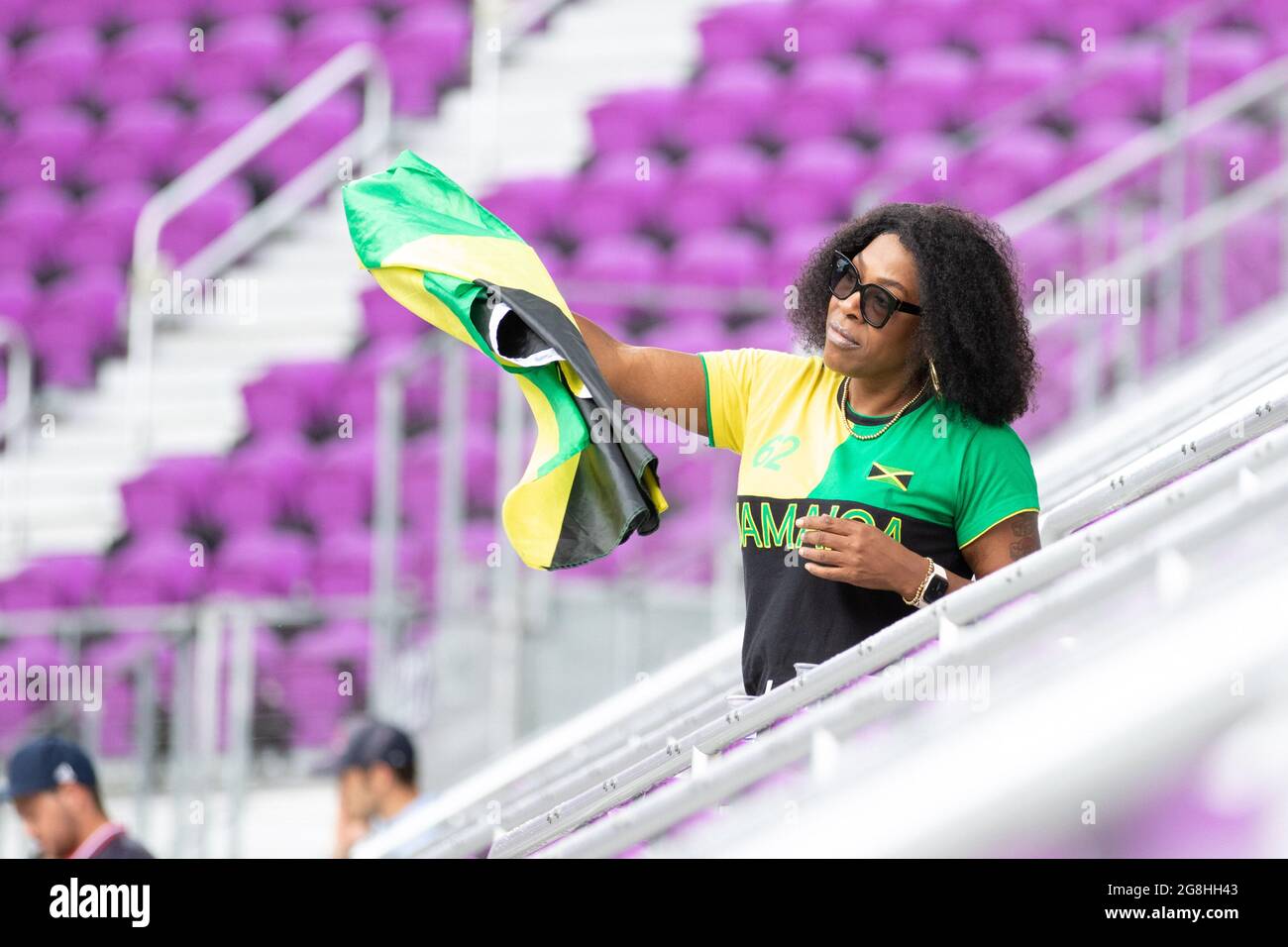 Orlando, United States. 21st July, 2021. Jamaican fan waves the Jamaican flag in support of the team during the CONCACAF Gold Cup game between Costa Rica and Jamaica at Exploria Stadium in Orlando, Florida. NO COMMERCIAL USAGE. Credit: SPP Sport Press Photo. /Alamy Live News Stock Photo