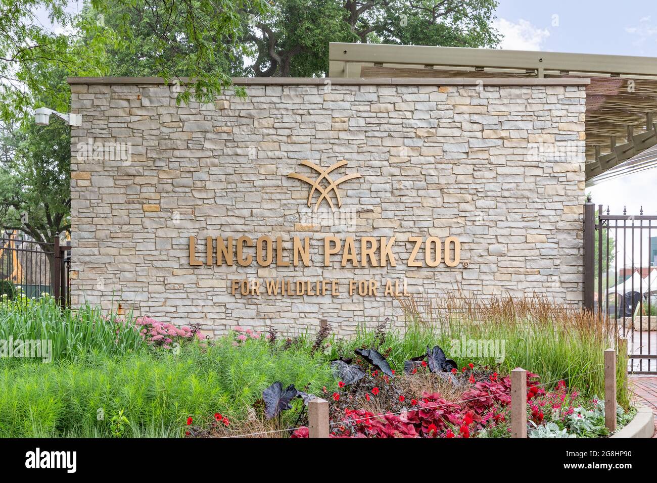 The exterior of Lincoln Park Zoo in the Lincoln Park neighborhood of Chicago. This zoo is free to everyone year round and features 1,100 animals. Stock Photo