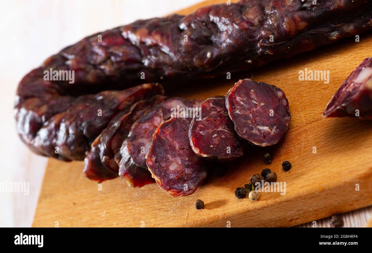 Dry cured sausage with liver Stock Photo Alamy