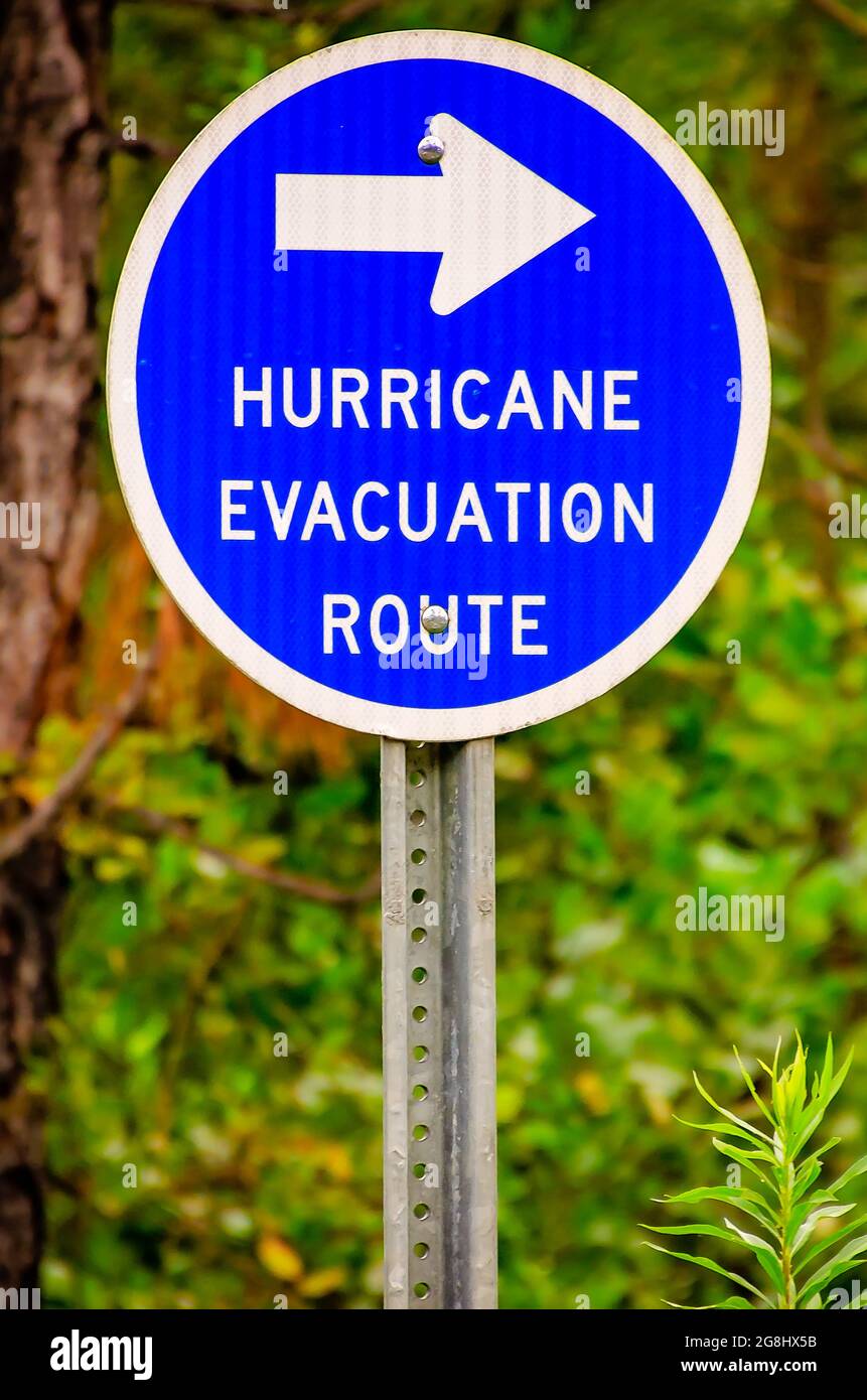A hurricane evacuation route sign directs drivers on Bellingrath Road toward the interstate, July 18, 2021, in Theodore, Alabama. Stock Photo