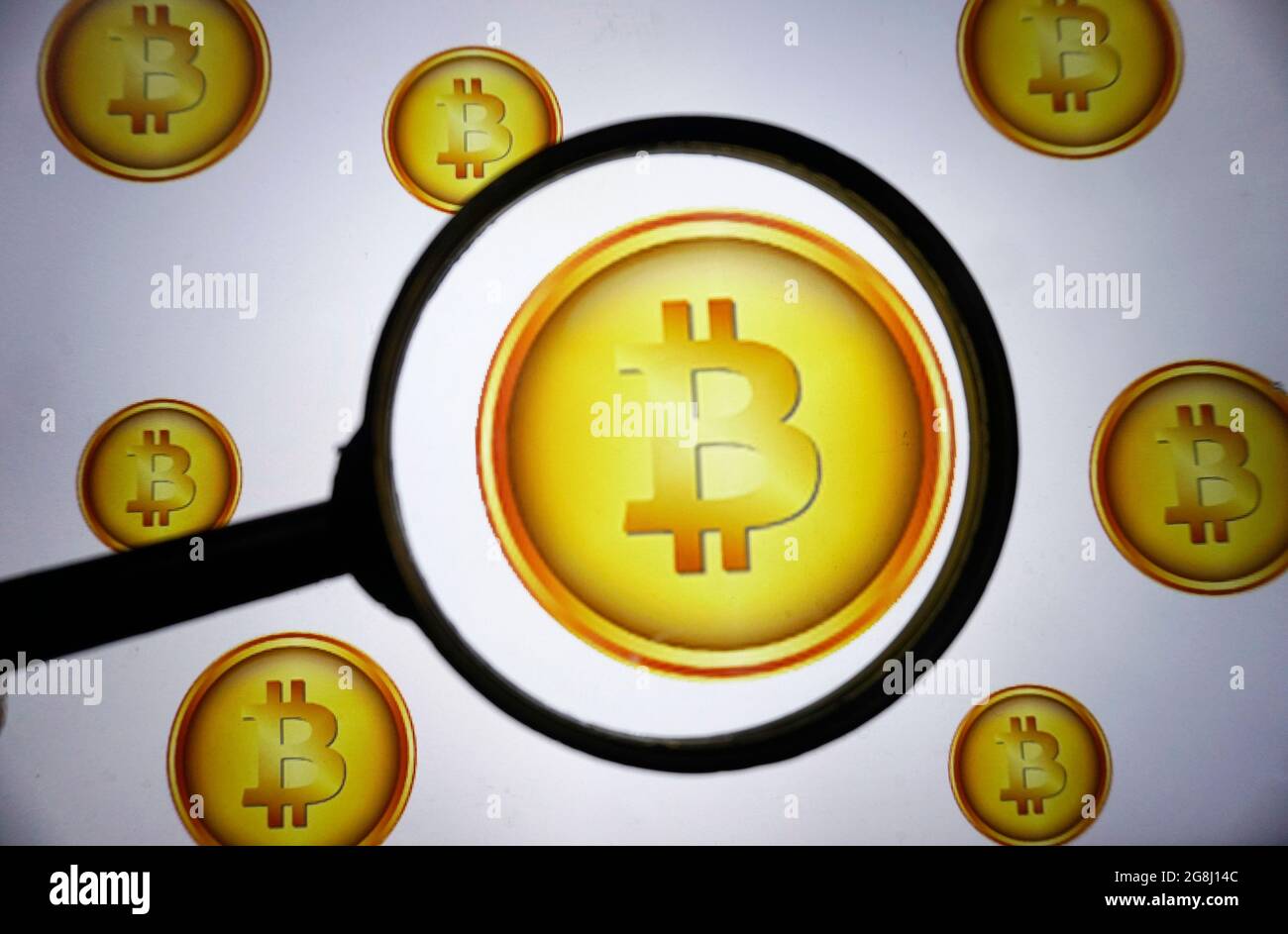 July 21, 2021: Nesta ilustraçÃ£o fotogrÃ¡fica, o Bitcoin criptomoeda visto exibido na tela de um computador através de uma lupa. (Credit Image: © Cris Faga/ZUMA Press Wire) Stock Photo