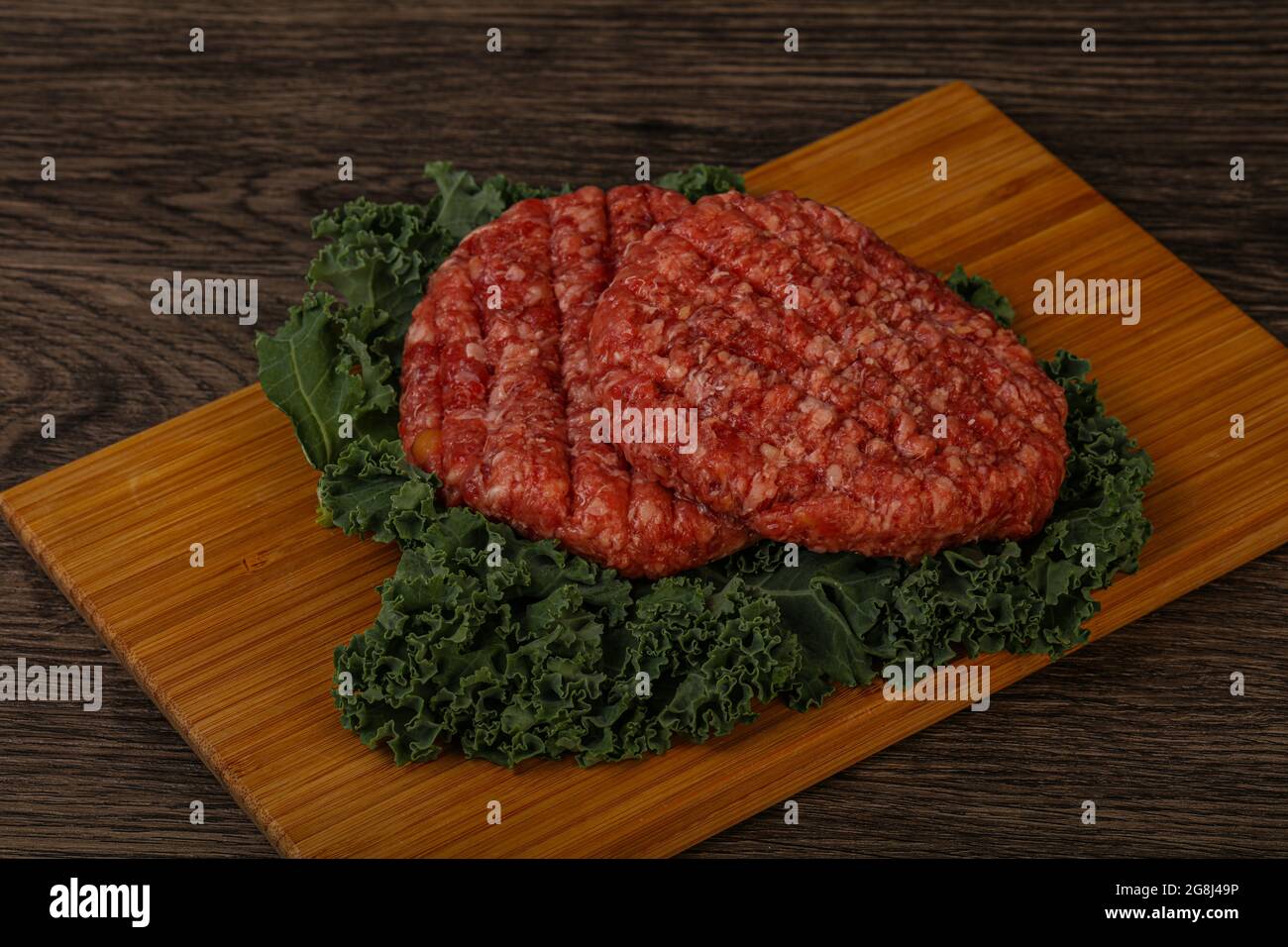 Raw beef burger cutlet for grill Stock Photo Alamy