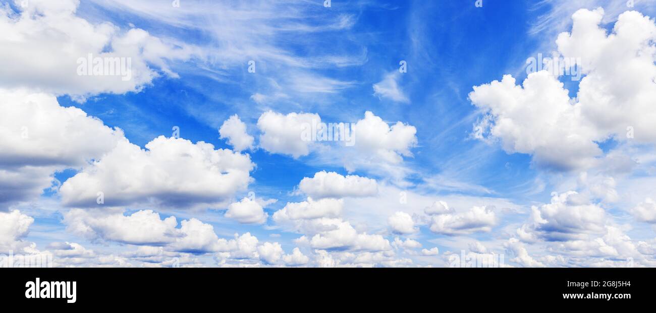White fluffy clouds clear blue sky background panorama, cumulus cloud texture, cloudy azure skies, cloudscape panoramic view, sunny heaven, cloudiness Stock Photo