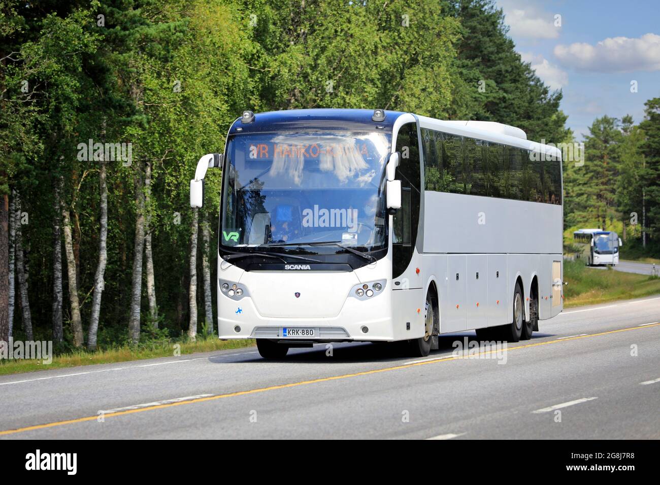 Two white Scania coach buses on road 25. Buses replace VR train service