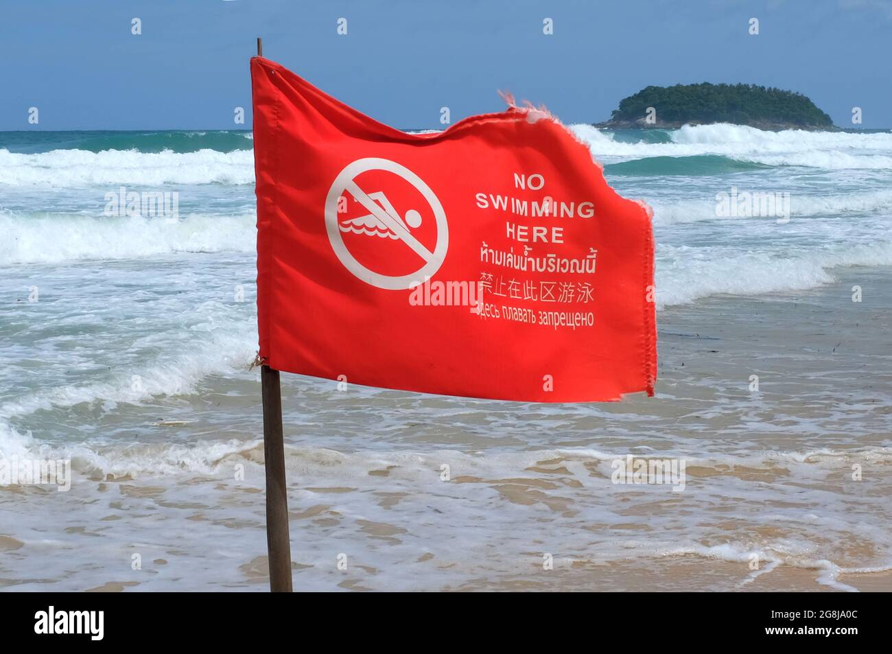 Red flags flying on Kata beach, Phuket Thailand Stock Photo Alamy