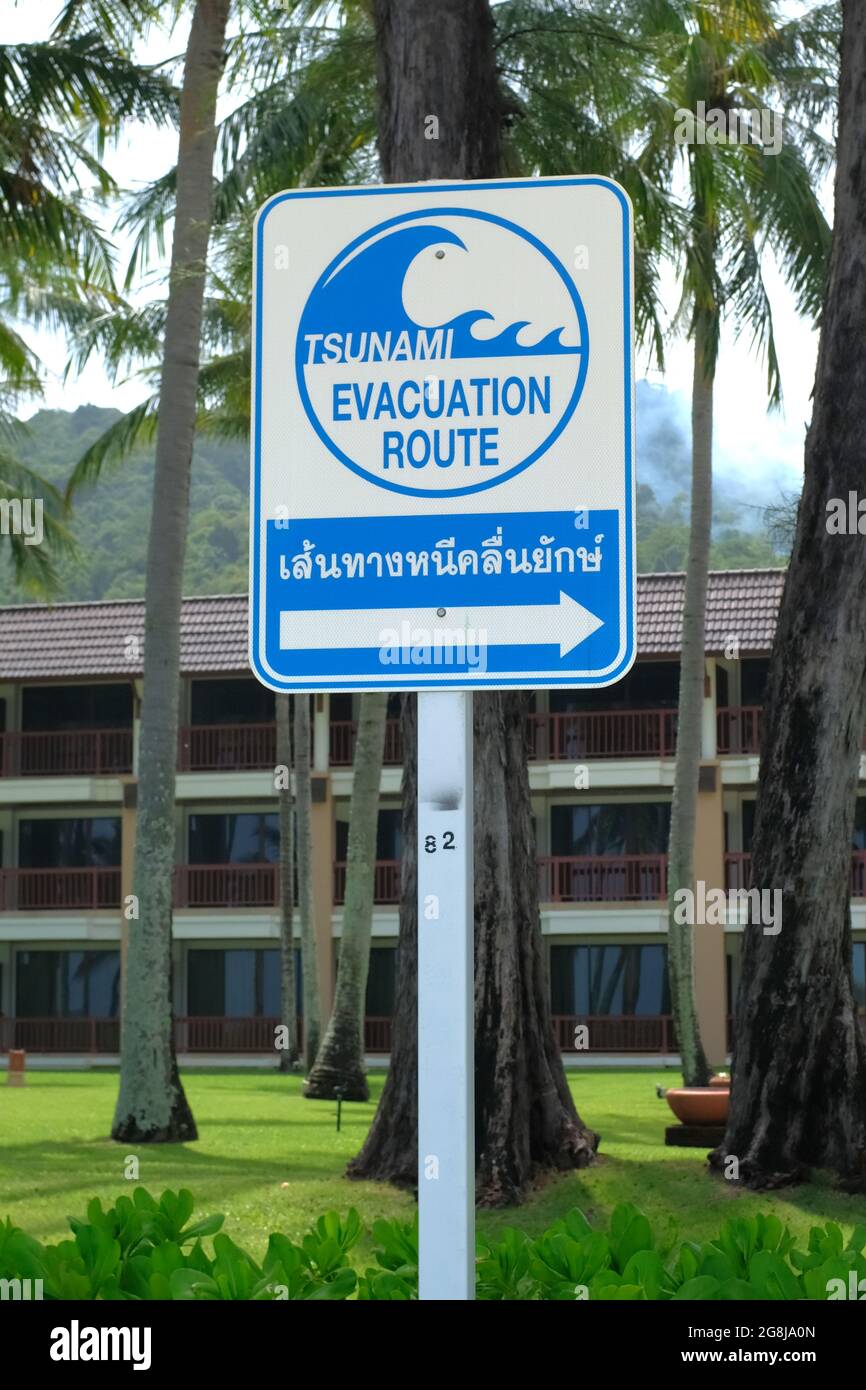 Tsunami evacuation sign on Kata beach, Phuket Thailand Stock Photo