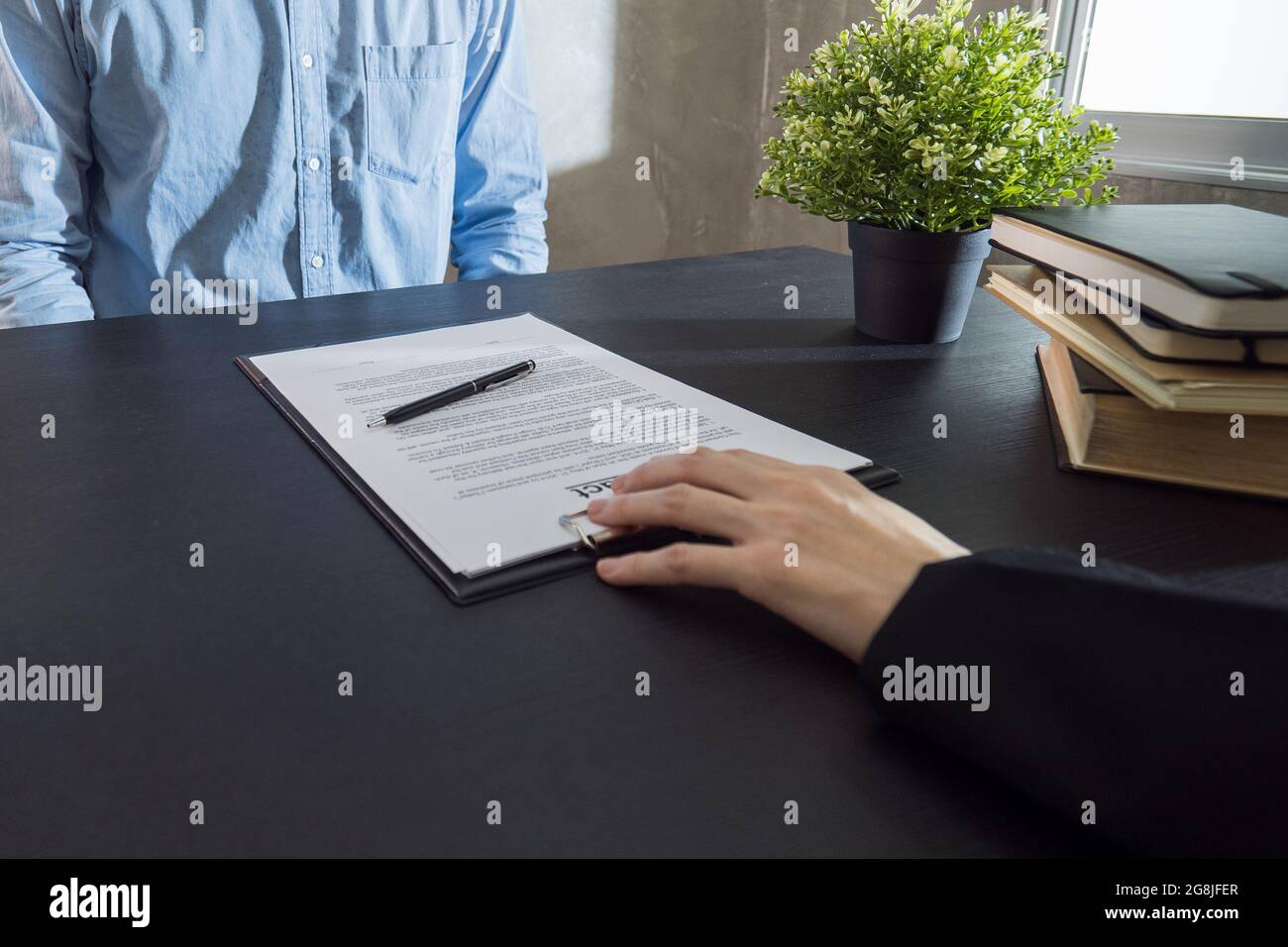 Put a contract to business partner. Stock Photo