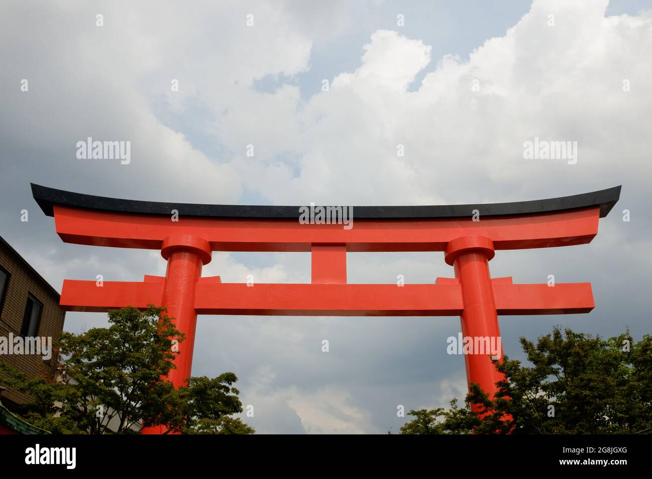 Main entrance to the Fushimi Inari shrine; the orange gates called tori, Kyoto, Japan Stock