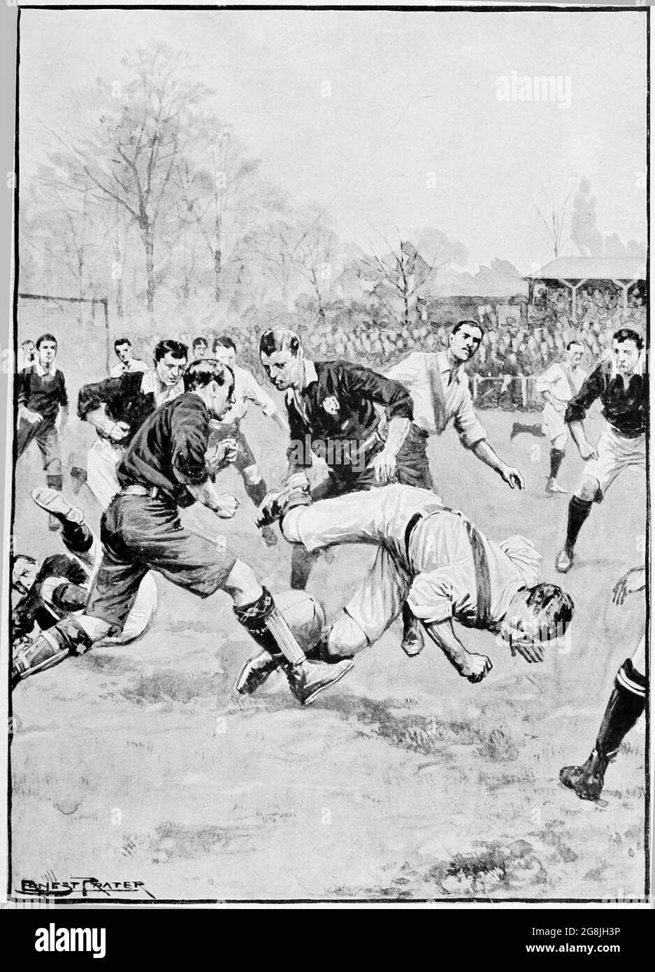 Ernest Prater - A Fall - Rough and Tumble of an early football match - 1905 Stock Photo