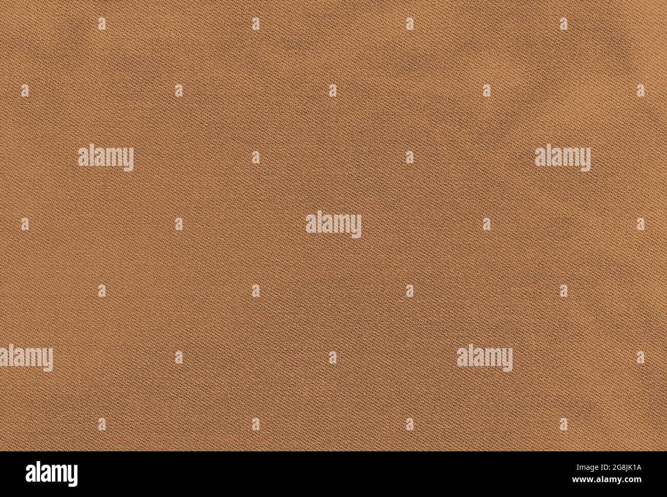 Brown cotton fabric meant as background Stock Photo