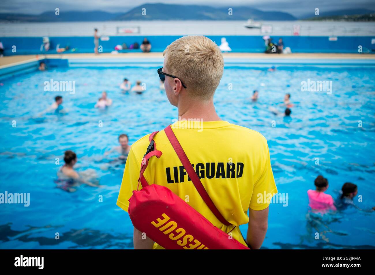 Lifeguard at Gourock outdoor swimming pool, Scotland. Stock Photo