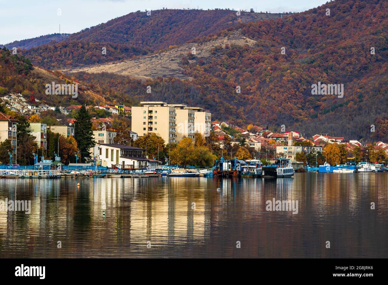 View of the Danube river and Orsova city vegetation and buildings in Orsova, Romania Stock Photo