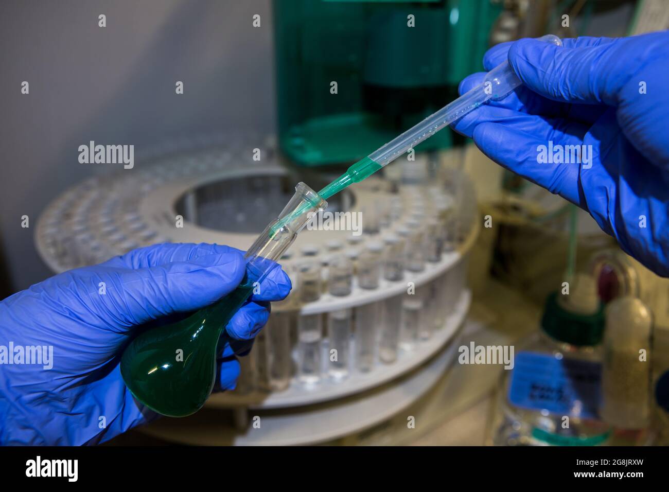 Scientist analysing CBD oil in a chemistry laboratory. Ion