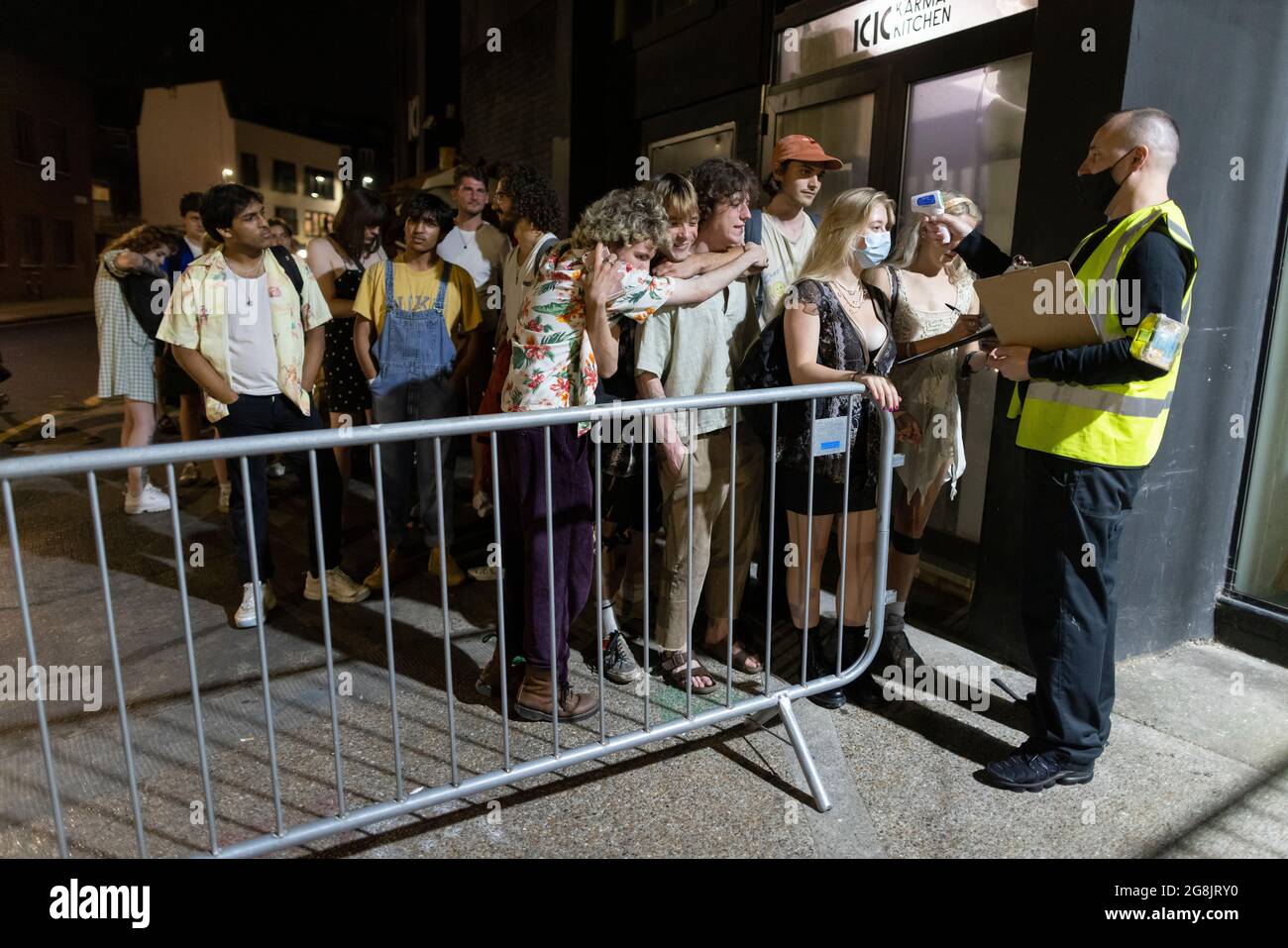 Clubbers head out to the Oval Space night club in the early hours on 'Freedom Day' where live music venues were allowed to reopen at 00.01 on July19th. Stock Photo