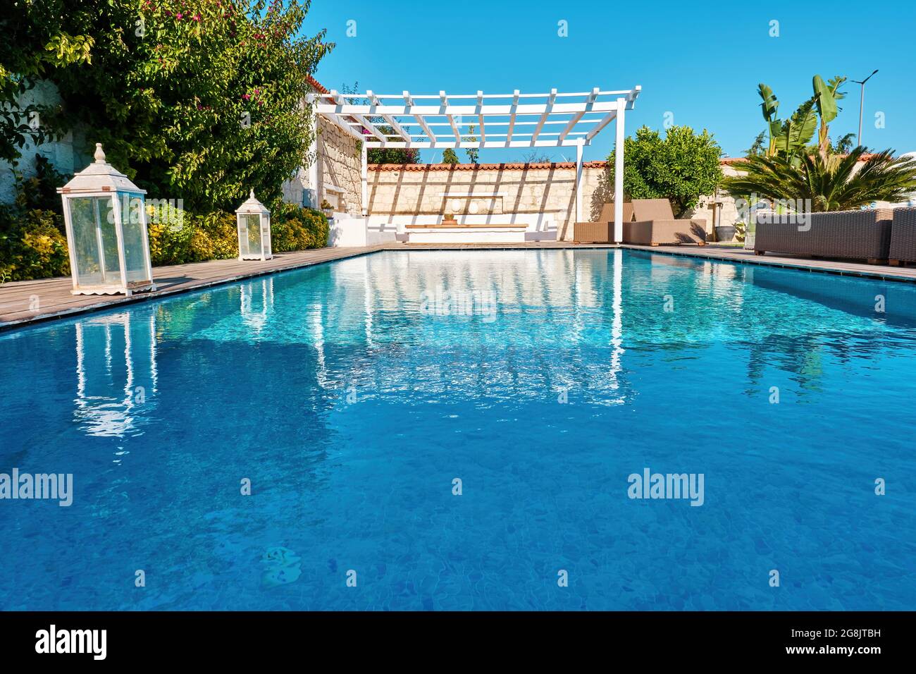Luxury swimming pool and patio of a residential Aegean or Mediterranean ...