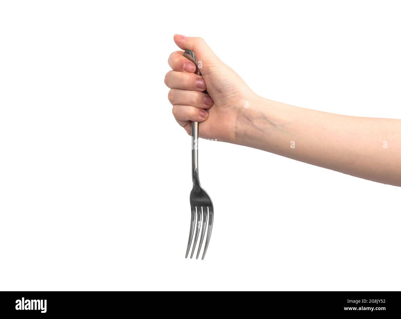 Hand with steel kitchen fork, isolated on a white background Stock Photo