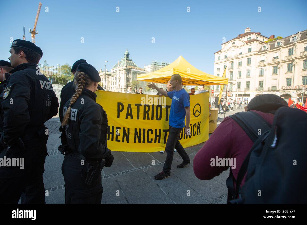 Munich, Germany. 26th Oct, 2019. Banner reading ' Patriots don't retreat '. The extreme right Verfassungsschutz surveilled Identitaere Bewegung held a rally on 26. October 2016 in Munich. (Photo by Alexander Pohl/Sipa USA) Credit: Sipa USA/Alamy Live News Stock Photo