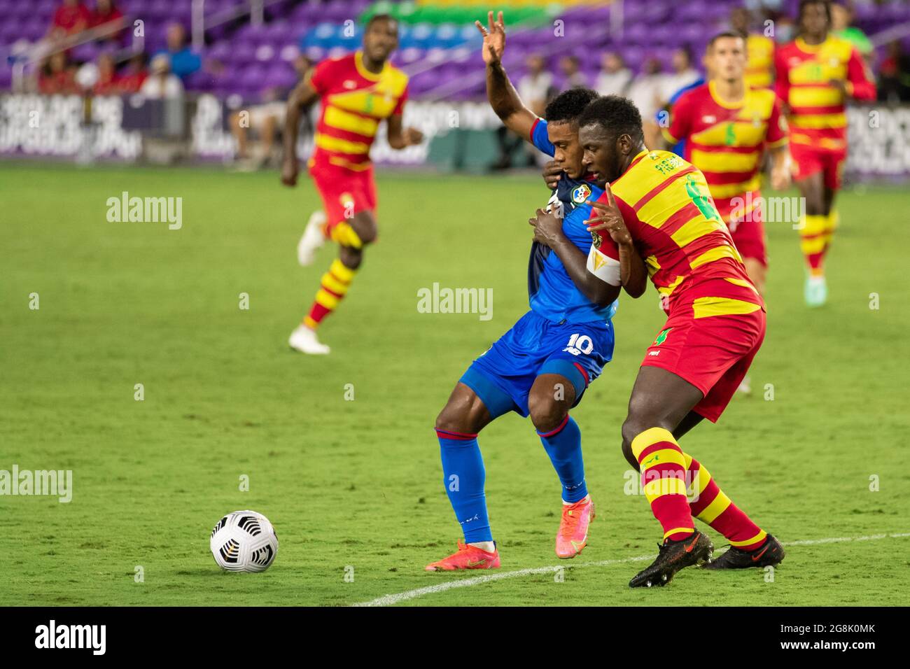 Orlando, United States. 21st July, 2021. Edgar Barcenas (10 Panama) shields the ball from Aaron Pierre (4 Grenada) during the CONCACAF Gold Cup game between Panama and Grenada at Exploria Stadium in Orlando, Florida. NO COMMERCIAL USAGE. Credit: SPP Sport Press Photo. /Alamy Live News Stock Photo