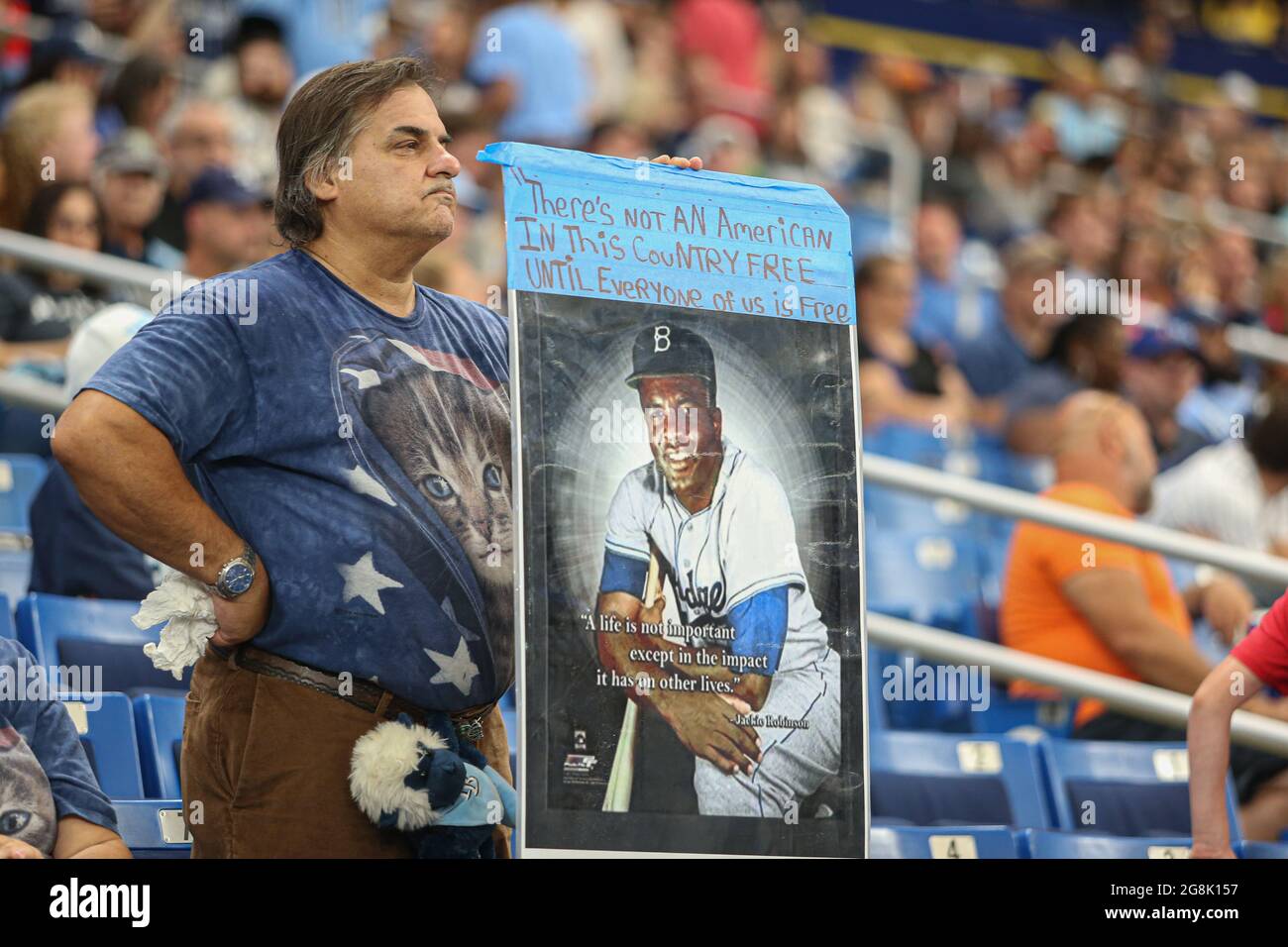 St. Petersburg, FL. USA; A general view of a fan holding a sign to ...