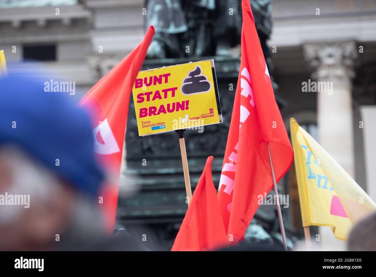 Munich, Germany. 06th Mar, 2020. Die Linke flags and FDP sign reading ' COlorful instead of brown ' at the antifascist protest ' Just don't do it ' organized by Bellevue di Monaco on 6. March 2020 at the Max-Josef-Platz in Munich. (Photo by Alexander Pohl/Sipa USA) Credit: Sipa USA/Alamy Live News Stock Photo