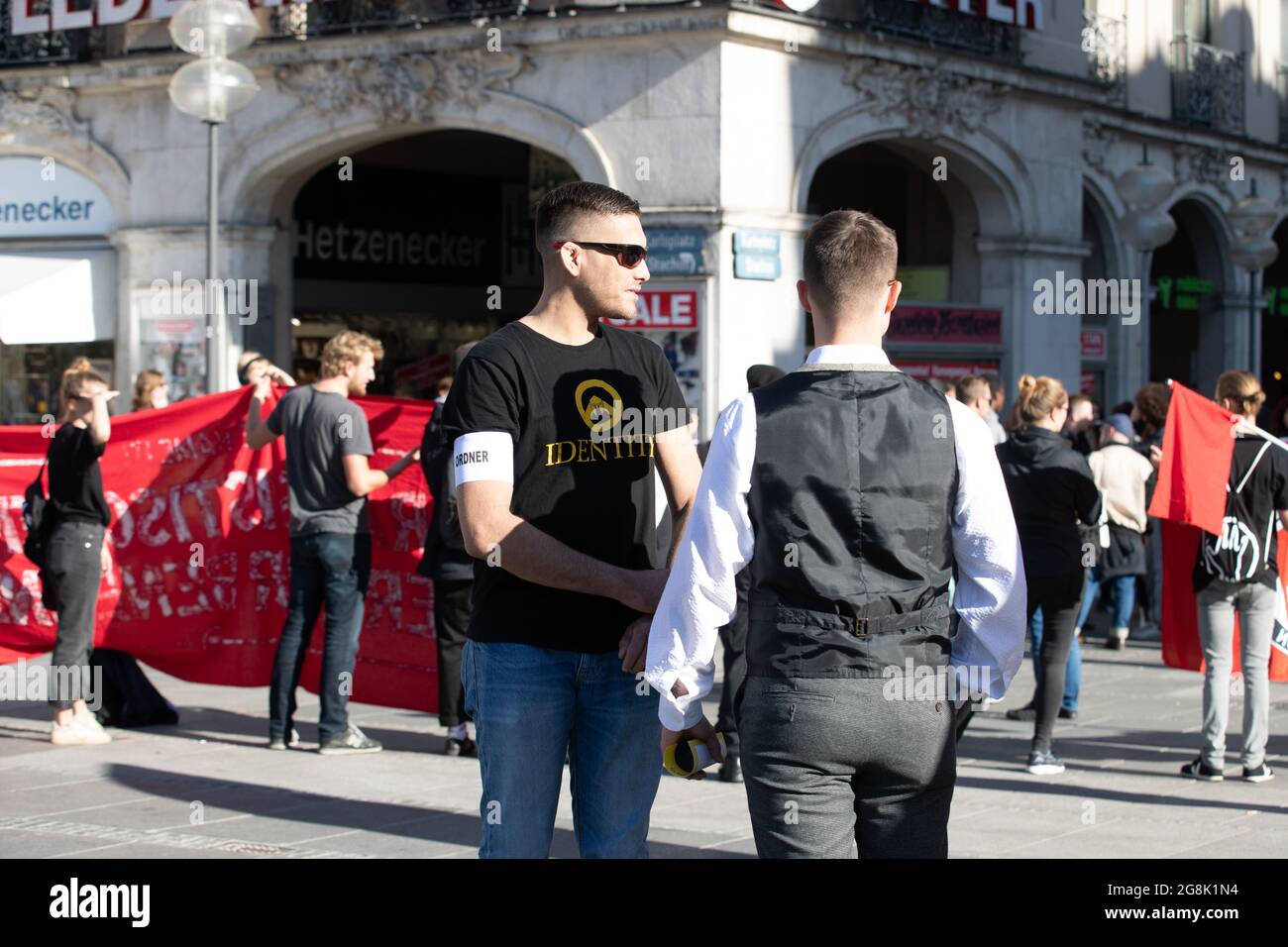 Munich, Germany. 26th Oct, 2019. Identity T-Shirt with a Lambda with an acient greek war helmet. The extreme right Verfassungsschutz surveilled Identitaere Bewegung held a rally on 26. October 2016 in Munich. (Photo by Alexander Pohl/Sipa USA) Credit: Sipa USA/Alamy Live News Stock Photo