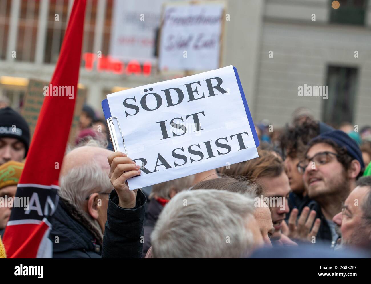 Munich, Germany. 06th Mar, 2020. Sign reading ' Soeder is a racist ' at the antifascist protest ' Just don't do it ' organized by Bellevue di Monaco on 6. March 2020 at the Max-Josef-Platz in Munich. (Photo by Alexander Pohl/Sipa USA) Credit: Sipa USA/Alamy Live News Stock Photo