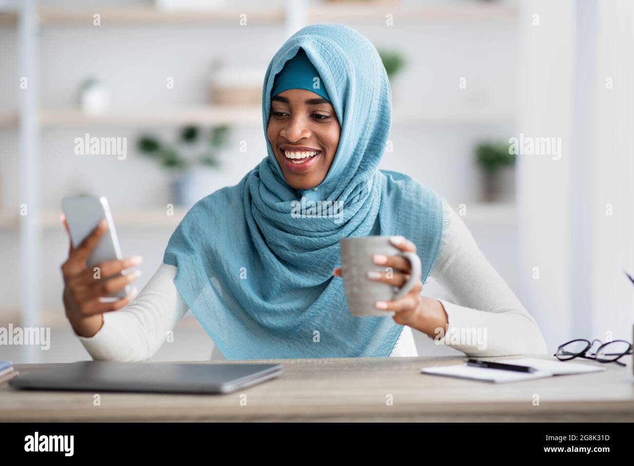 Cheerful Black Muslim Lady Making Video Call With Smartphone And ...