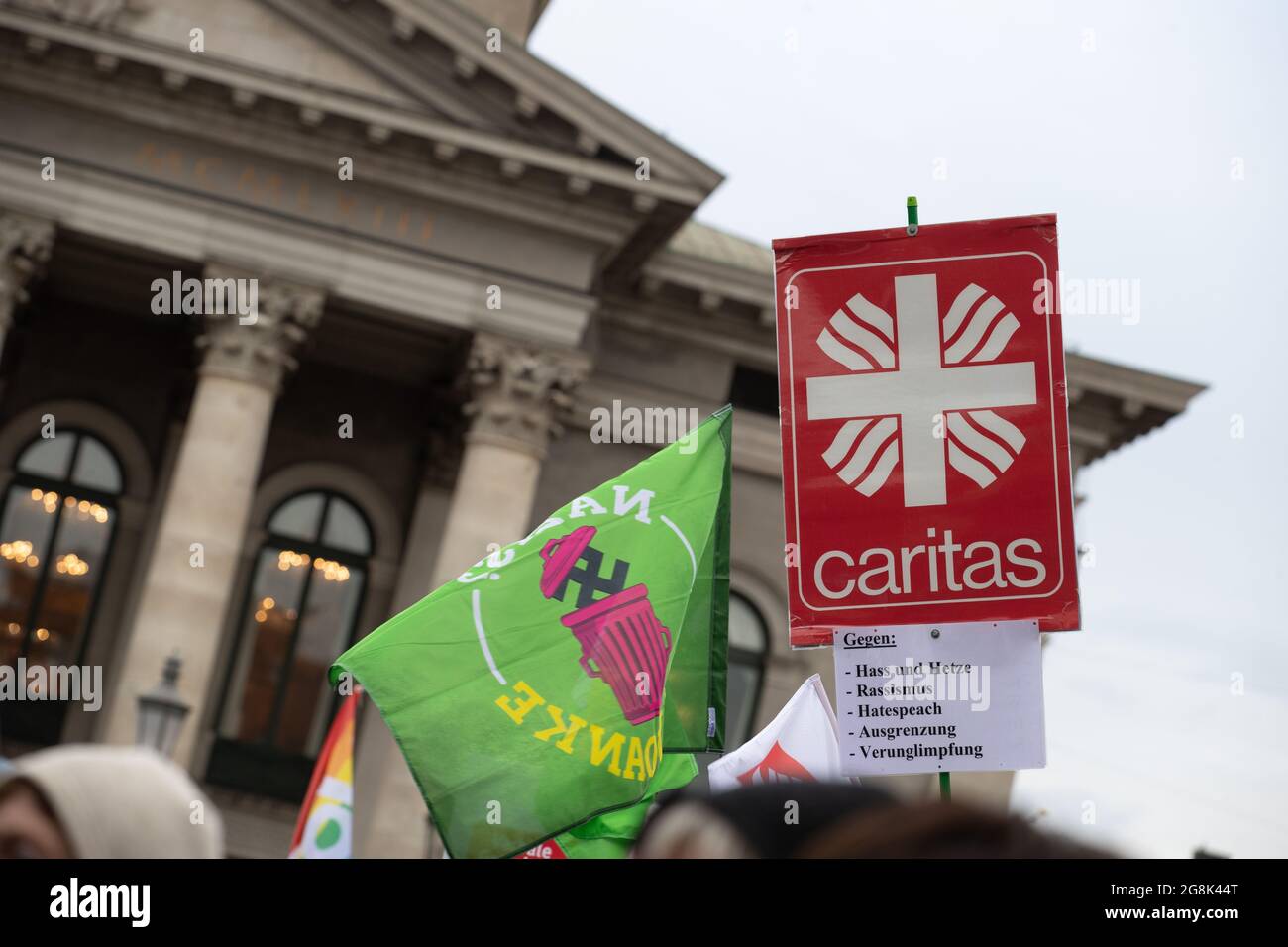 Munich, Germany. 06th Mar, 2020. Caritas against hate and racism at the antifascist protest ' Just don't do it ' organized by Bellevue di Monaco on 6. March 2020 at the Max-Josef-Platz in Munich. (Photo by Alexander Pohl/Sipa USA) Credit: Sipa USA/Alamy Live News Stock Photo
