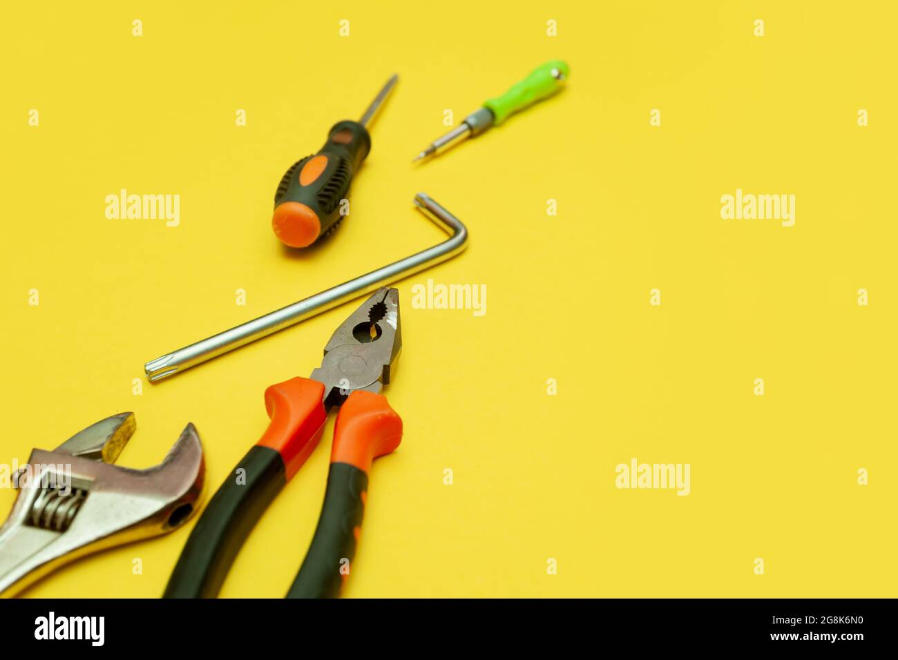 Yellow drill machine screwdriver wrench hi-res stock photography and ...