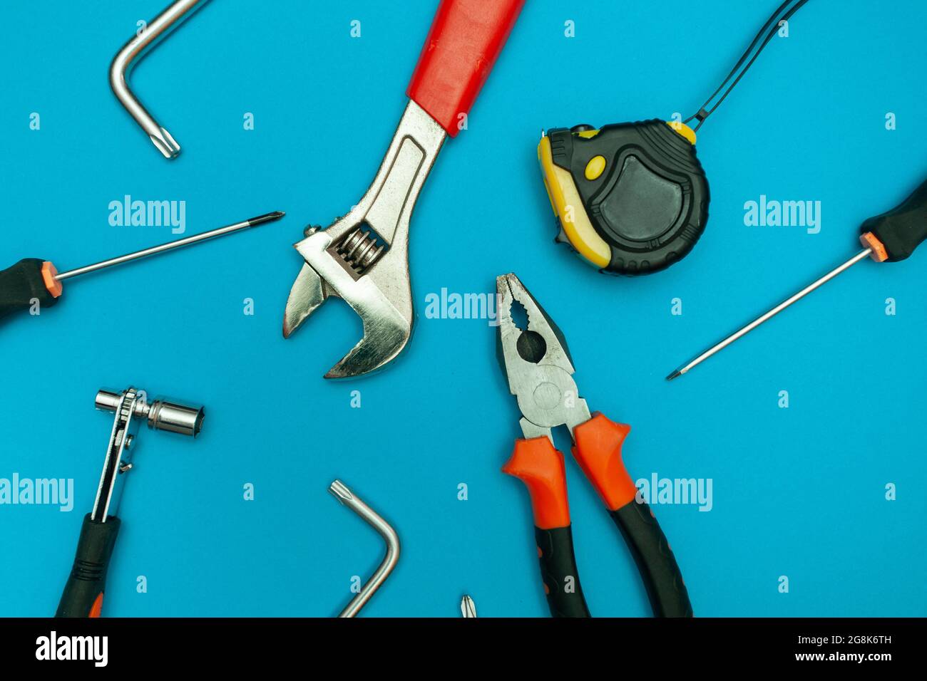 Tools Background Blue tools on isolated blue background Stock Photo - Alamy