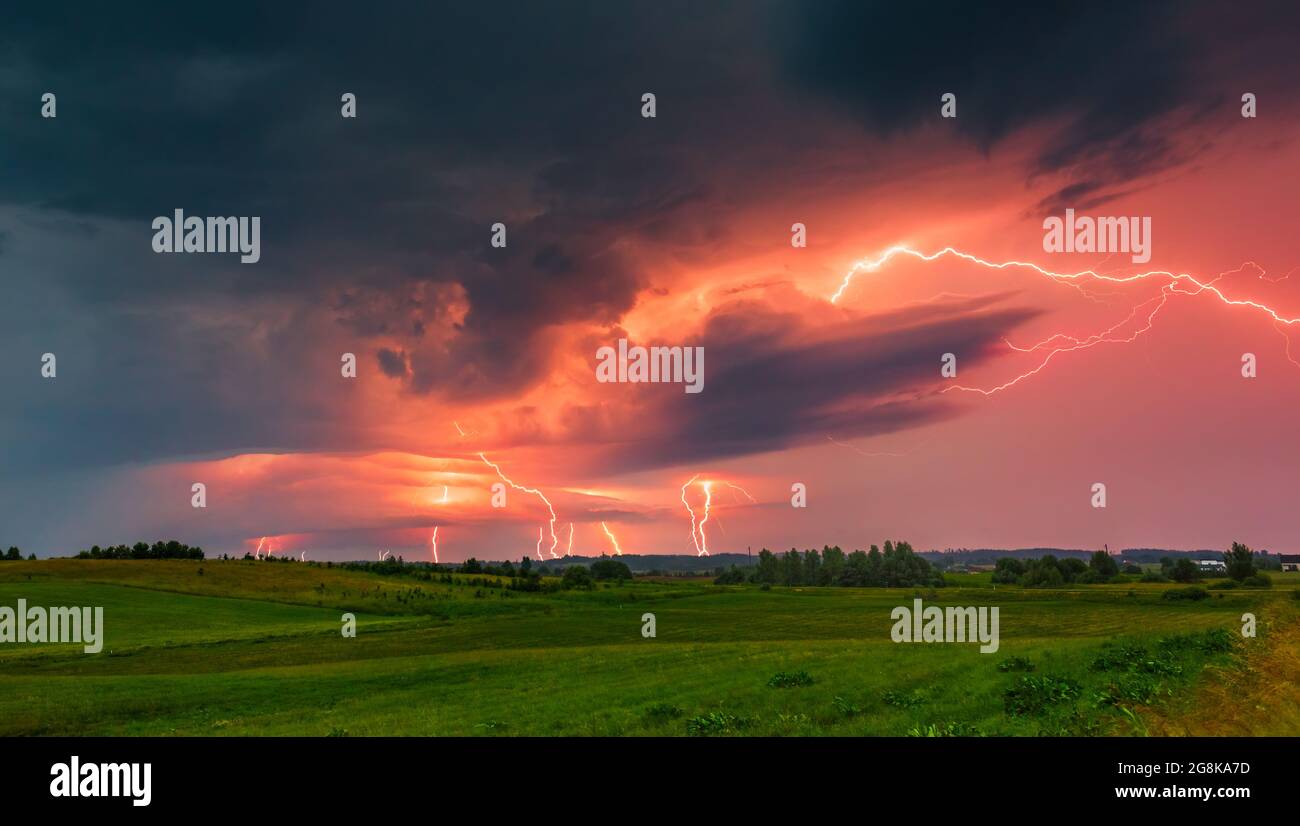 Thunder lightning storm clouds with lot of ligtning bolts Stock Photo ...