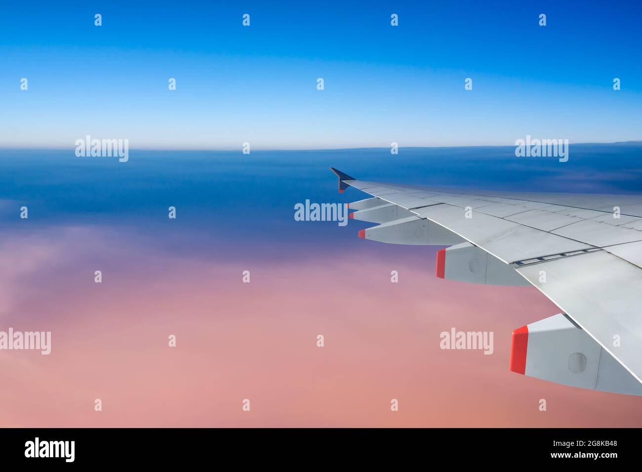 Plane wing and sky with copyspace, travel concept Stock Photo